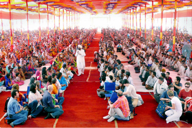 On tour in India, following a discourse and meditation.
